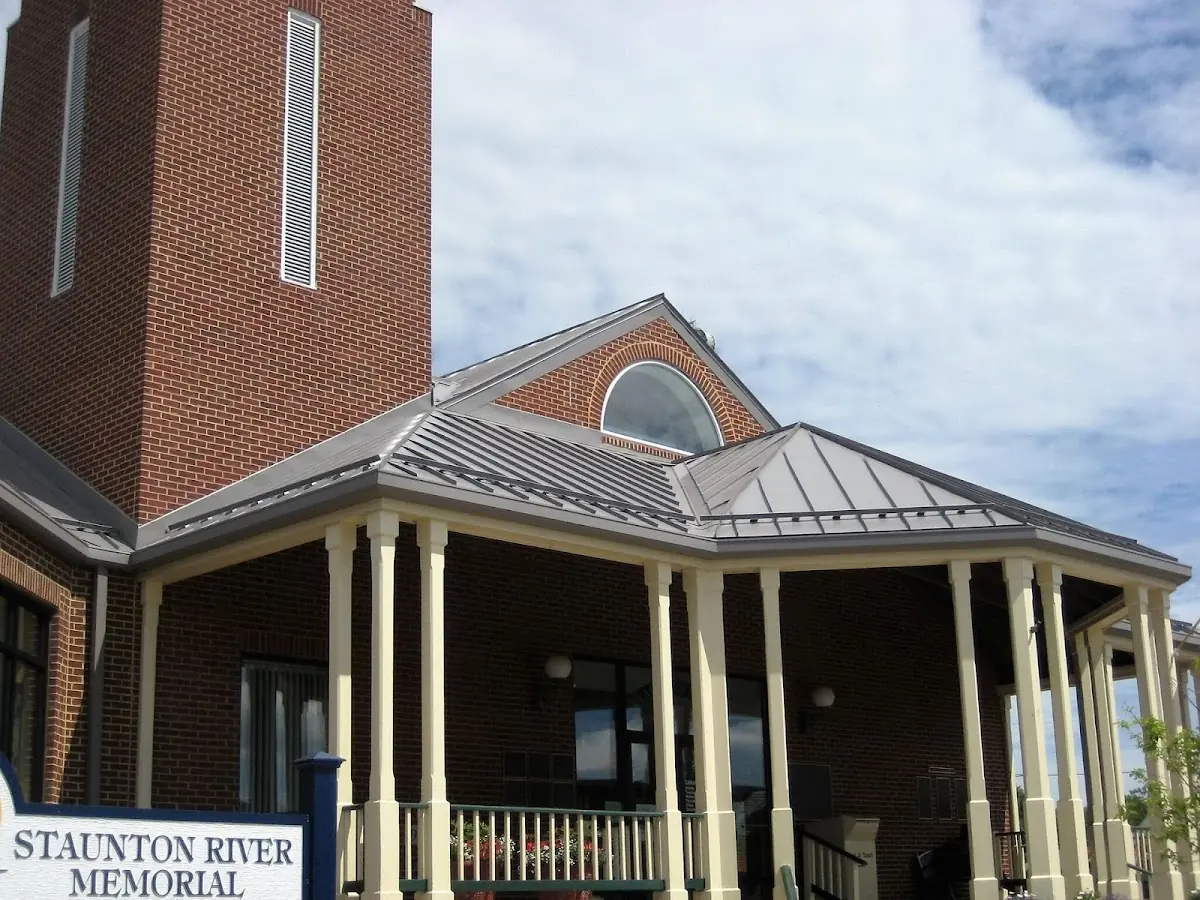 Skilled roofing craftsmen working on a residential roof in Augusta Hills